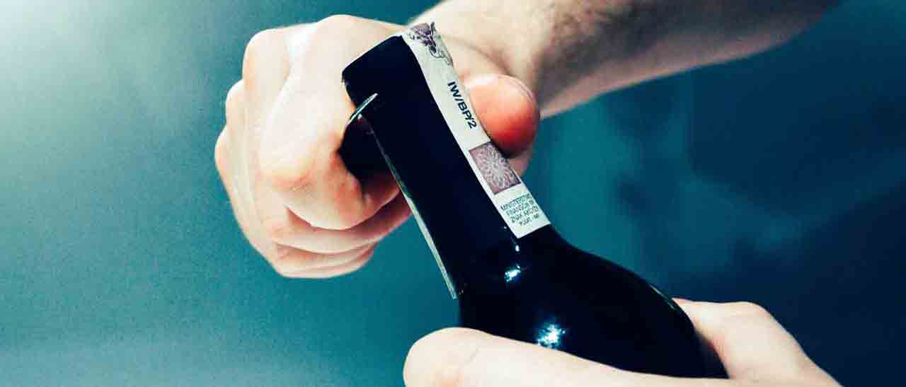 wine bottle being opened