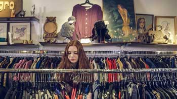 woman looking at clothes