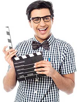 teen holding movie marker