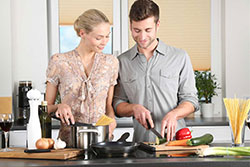 two people in kitchen